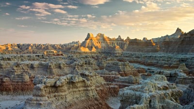 Bing wallpaper July 22, 2025. Sunset over Badlands National Park, South Dakota (© Petr Bednarik/Danita Delimont/Alamy)