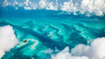 Bing wallpaper July 10, 2025. Turquoise waters of the Bahamas (© BlueOrange Studio/Adobe Stock)