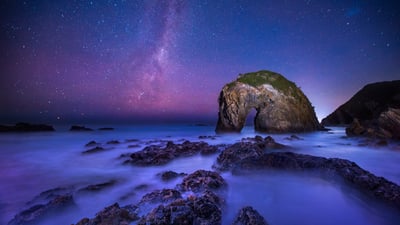 Bing wallpaper June 26, 2025. The Milky Way over Horse Head Rock, New South Wales, Australia (© Philip Thurston/Getty Images)